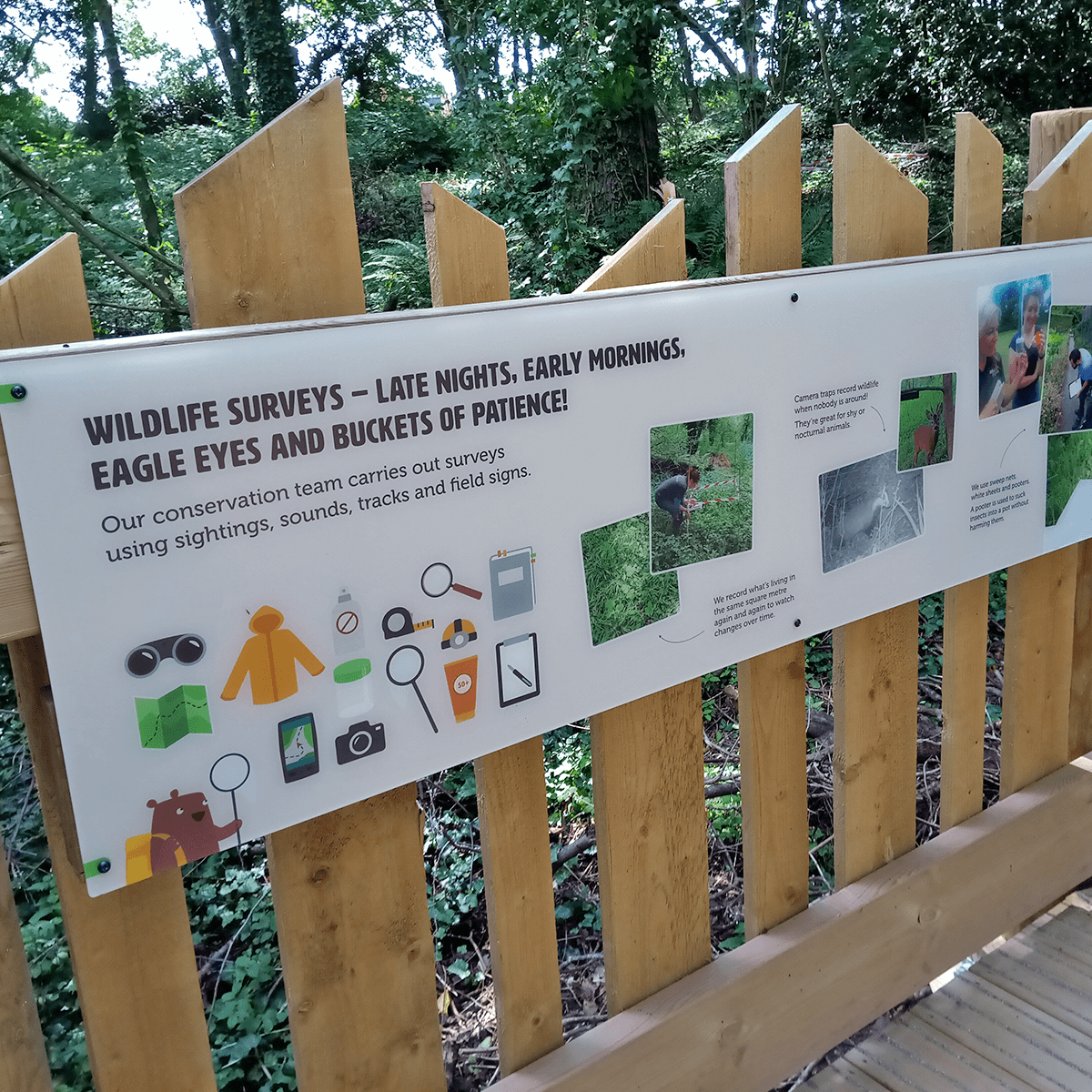 Informative panel about local conservation that reads Wildlife surveys, late nights, early mornings, eagle eyes and buckets of patience